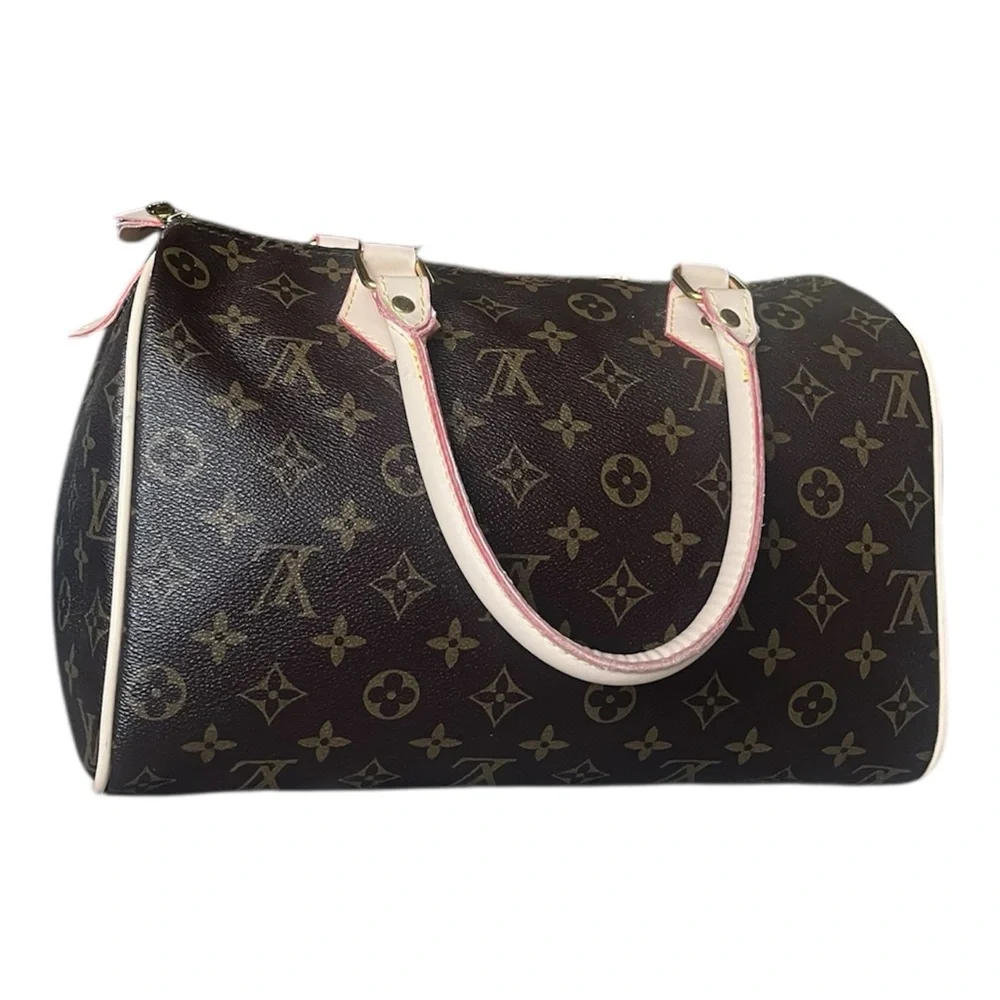 Louis Vuitton Speedy bag in monogram canvas with cream trim. - Picture 3 of 10